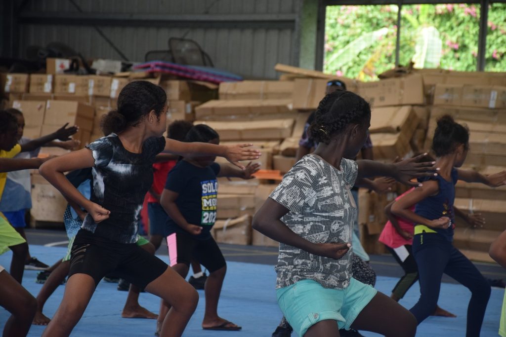 Police children learn basic Kung Fu martial art